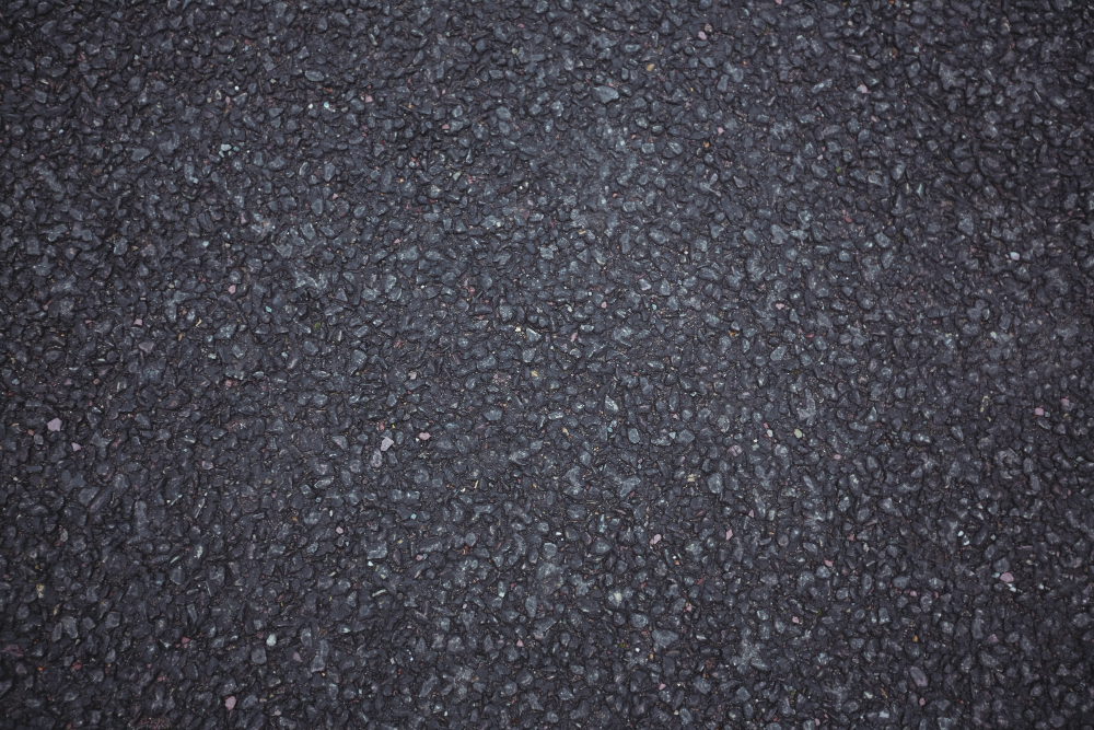 Asphalt Overlay vs Repaving vs Sealcoating: What's Best for Your Project?