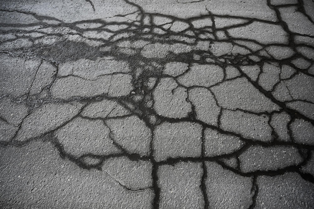 How to Repair & Prevent Cracks in Your Asphalt Driveway