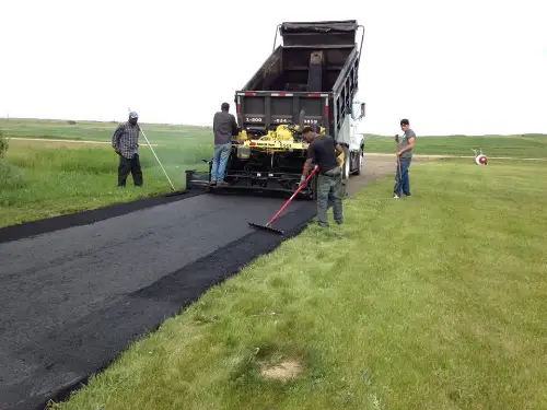 A. Rafferty team laying new asphalt