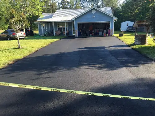 Residential driveway after asphalt paving